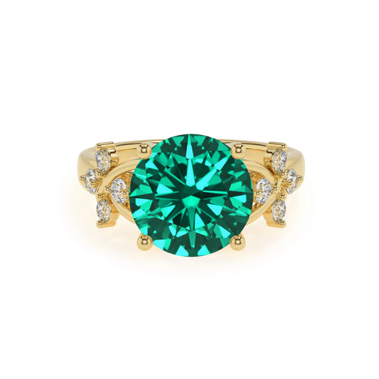 lab grown emerald round solitaire rings in yellow gold