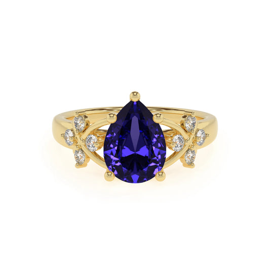 lab grown tanzanite pear solitaire rings in yellow gold