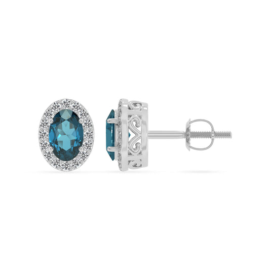 natural london blue topaz oval stud earrings in platinum