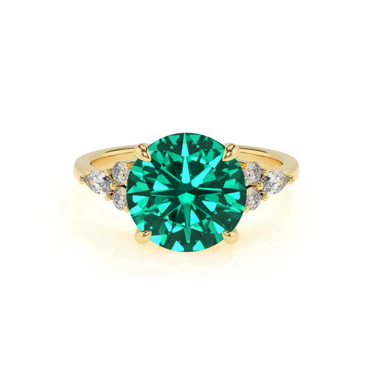 lab grown emerald round solitaire rings in yellow gold