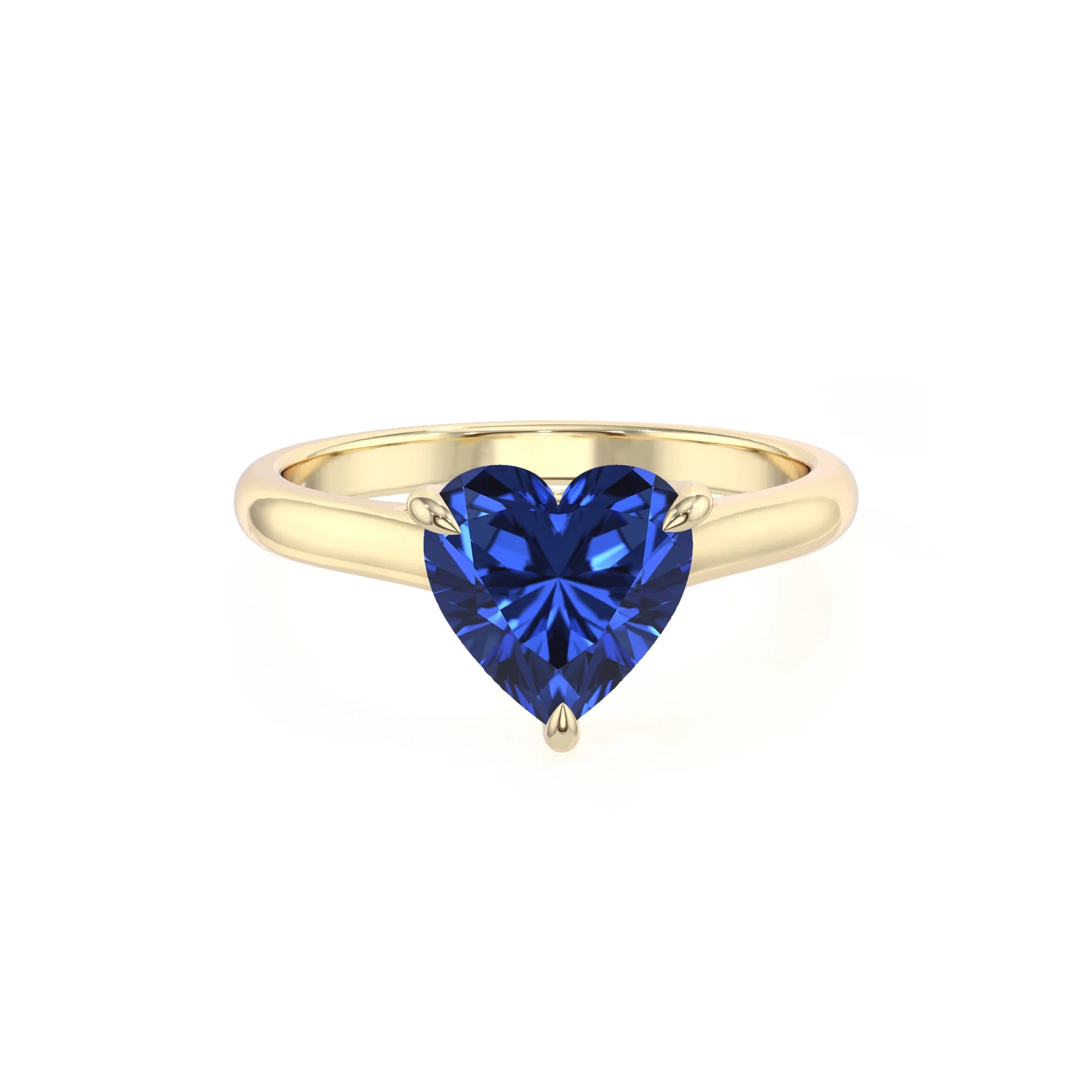 lab grown blue-sapphire heart solitaire rings in yellow gold