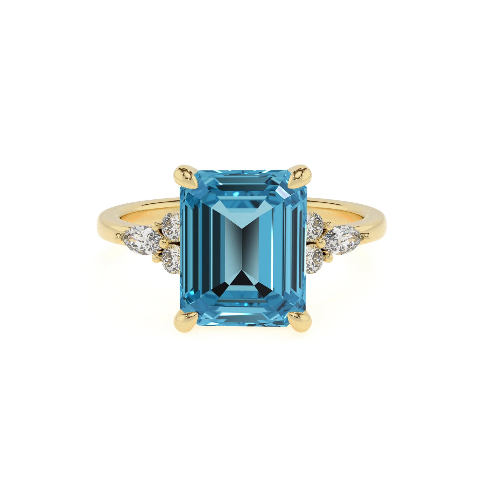 natural swiss-blue-topaz emerald cut solitaire rings in yellow gold