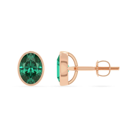lab grown emerald oval stud earrings in rose gold