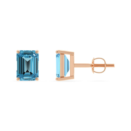natural swiss blue topaz emerald cut stud earrings in rose gold