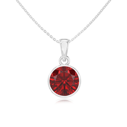 lab grown ruby round solitaire necklaces in sterling silver