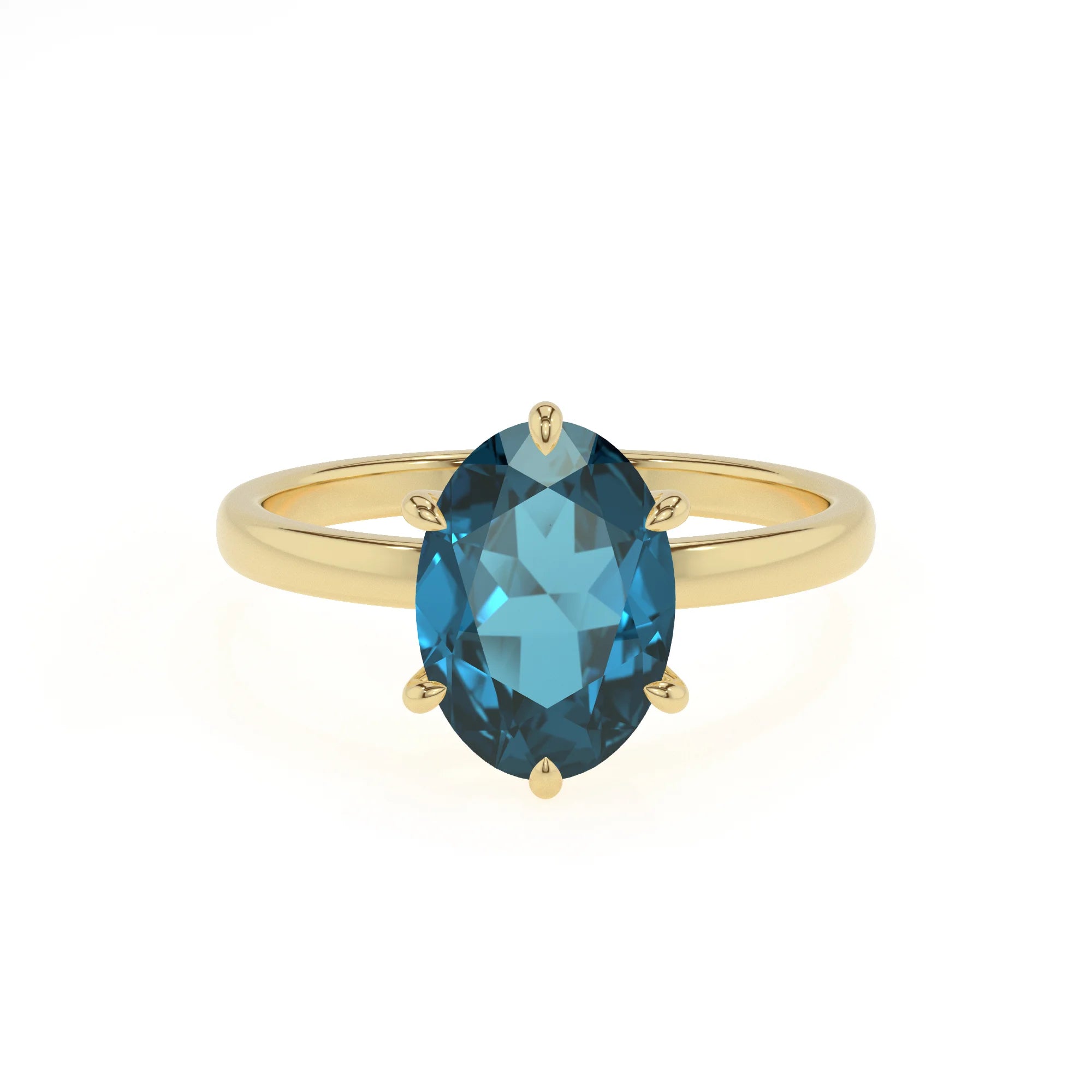 natural london-blue-topaz oval solitaire rings in yellow gold