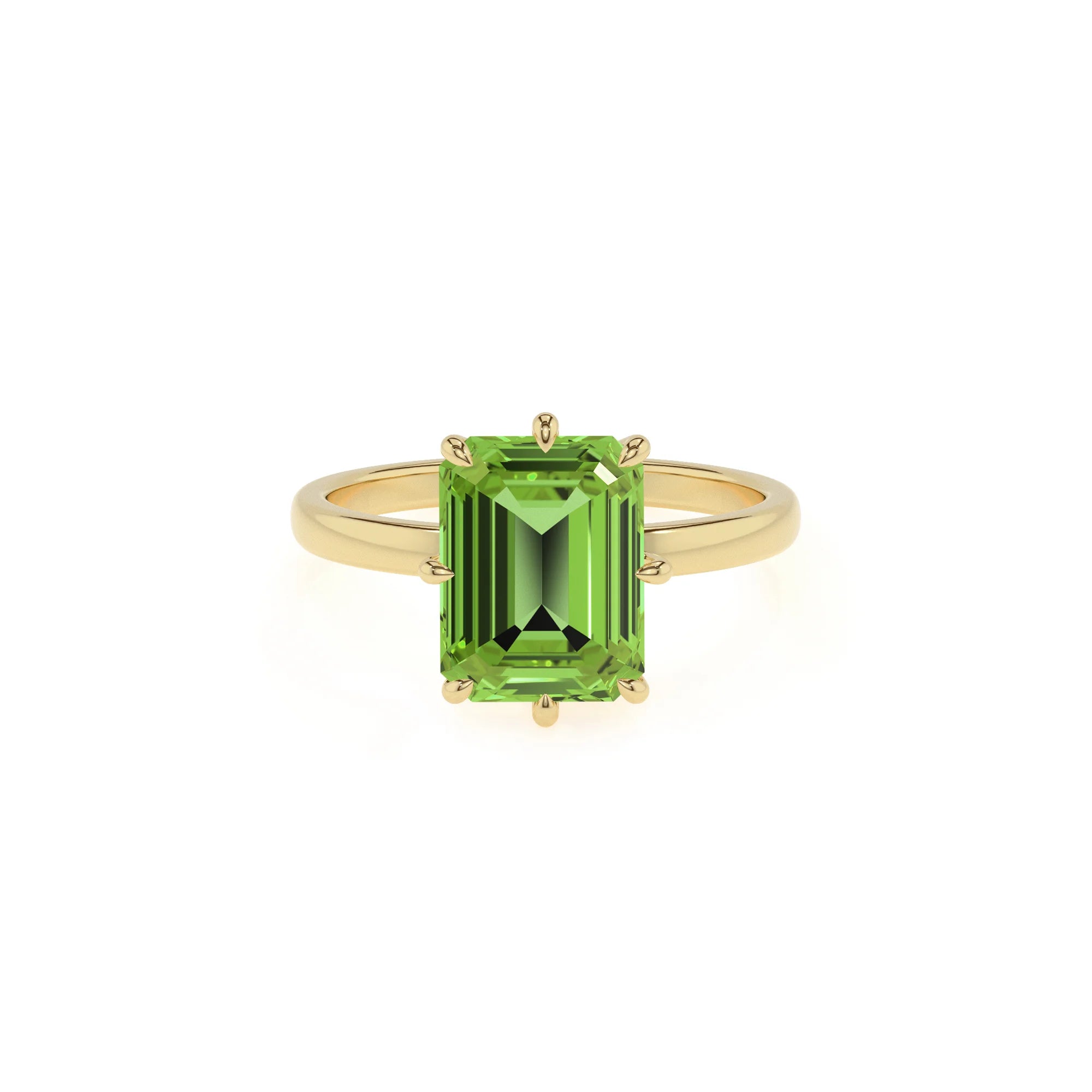 natural peridot emerald cut solitaire rings in yellow gold