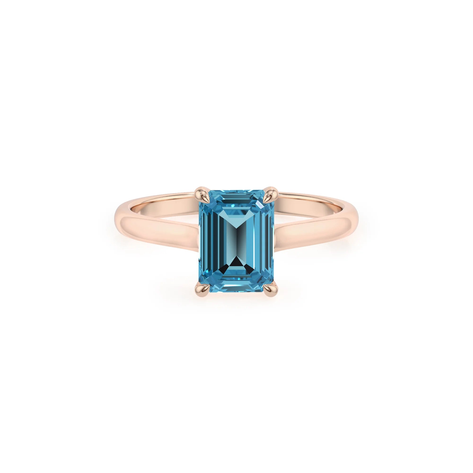 natural swiss-blue-topaz emerald cut solitaire rings in rose gold