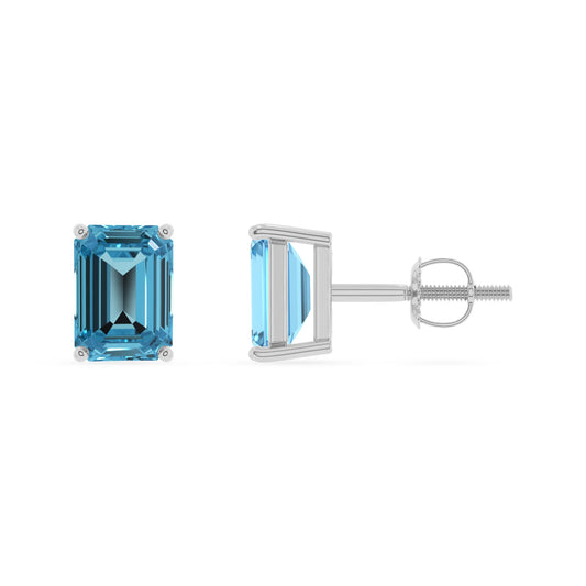 natural swiss blue topaz emerald cut stud earrings in white gold