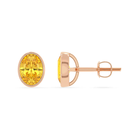 lab grown yellow sapphire oval stud earrings in rose gold
