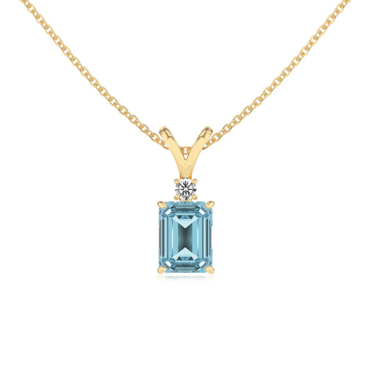 lab grown aquamarine emerald cut solitaire v-bale necklaces in yellow gold