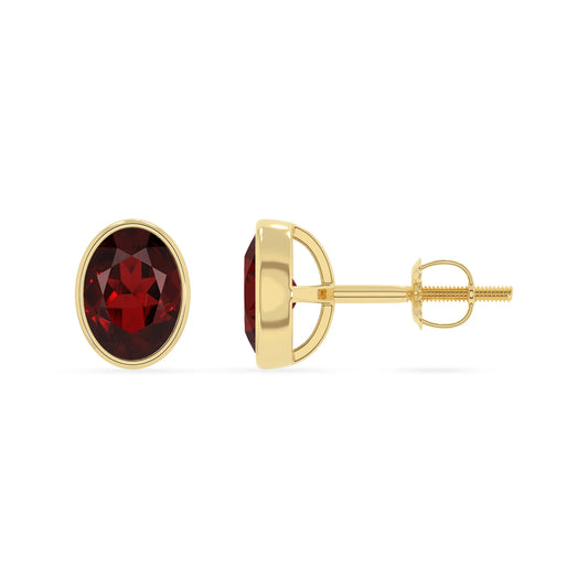 natural garnet oval stud earrings in yellow gold