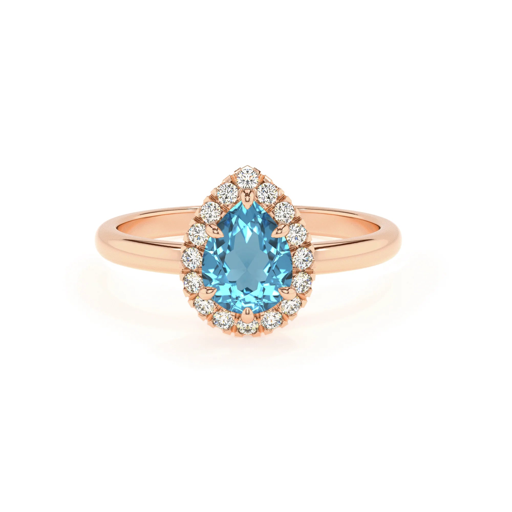 natural swiss-blue-topaz pear solitaire rings in rose gold