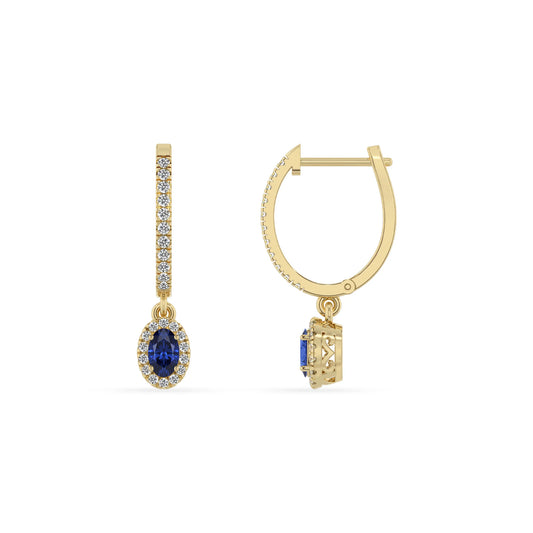 lab grown blue sapphire oval drop earrings in yellow gold