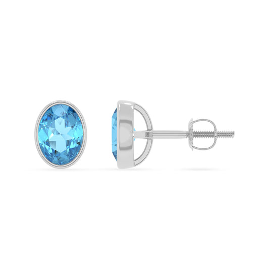 natural swiss blue topaz oval stud earrings in white gold