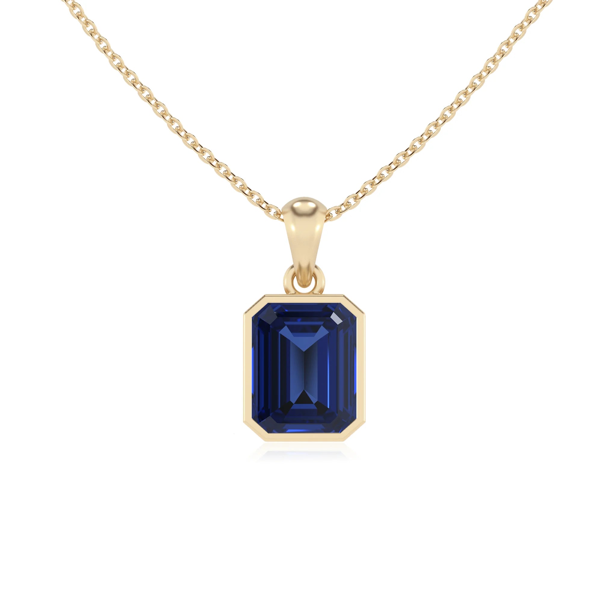 lab grown blue-sapphire emerald cut solitaire necklaces in yellow gold