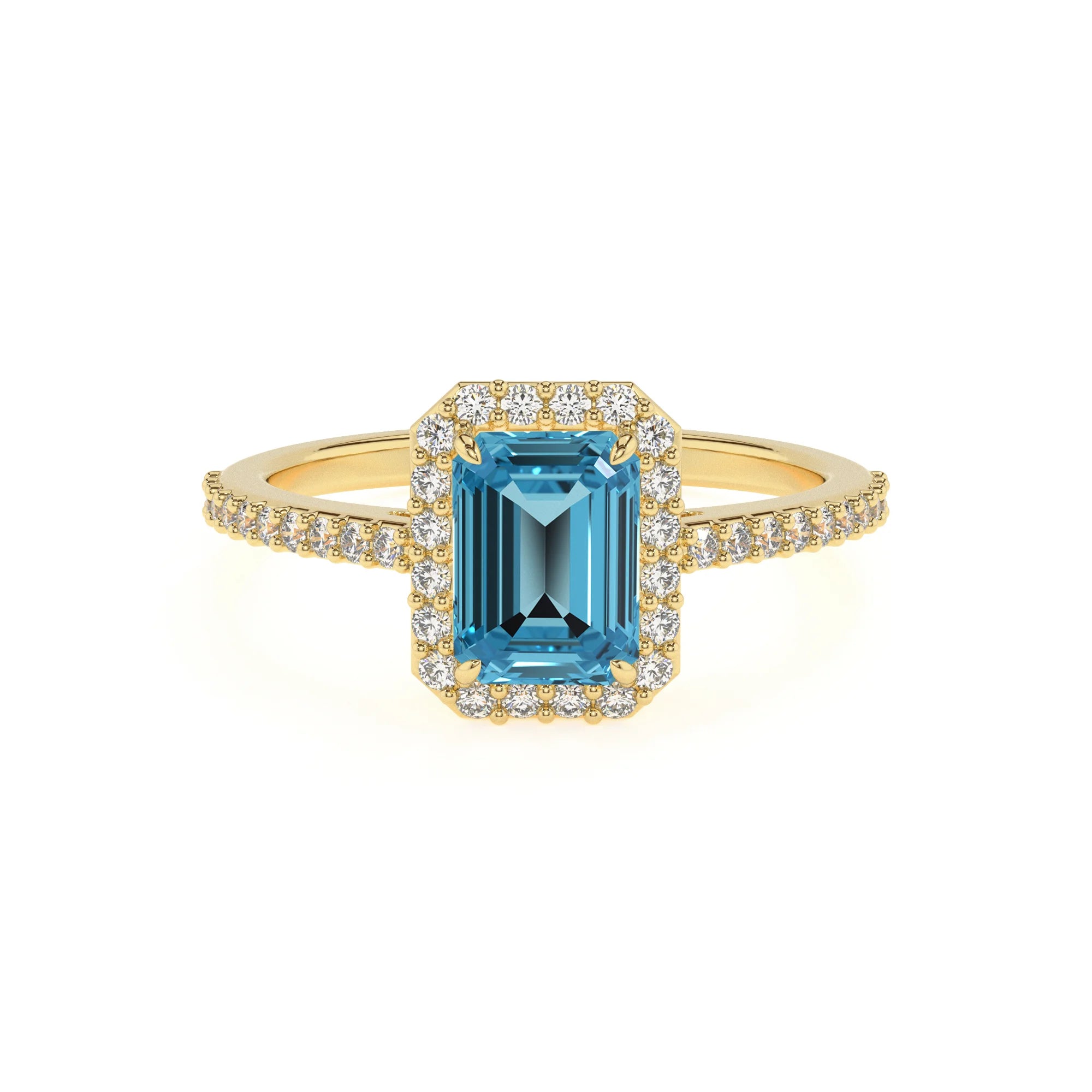 natural swiss-blue-topaz emerald cut solitaire rings in yellow gold