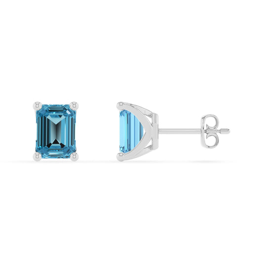 natural swiss blue topaz emerald cut stud earrings in platinum