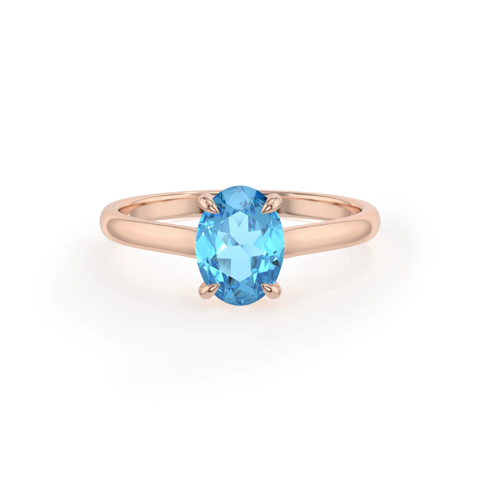 natural swiss-blue-topaz oval solitaire rings in rose gold