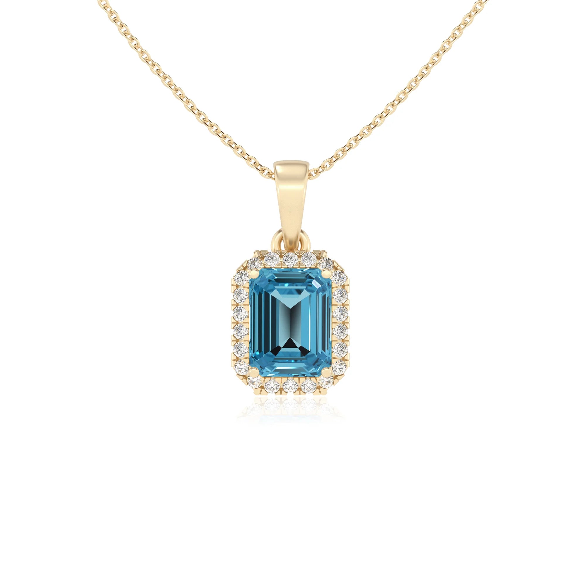 natural swiss-blue-topaz emerald cut solitaire necklaces in yellow gold