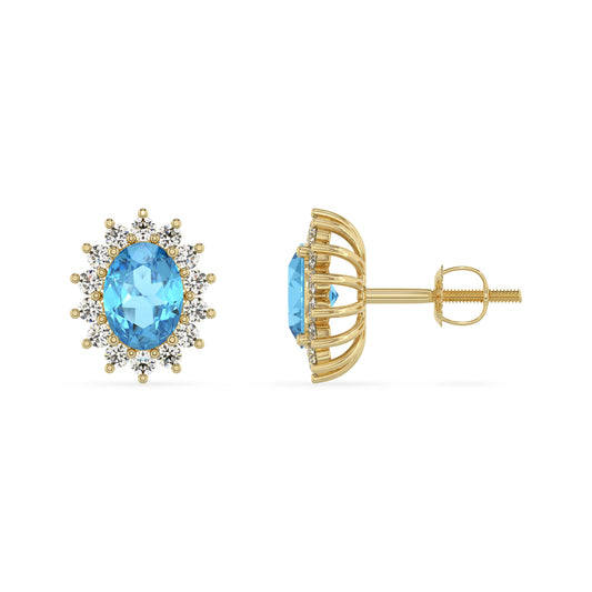 natural swiss blue topaz oval stud earrings in yellow gold