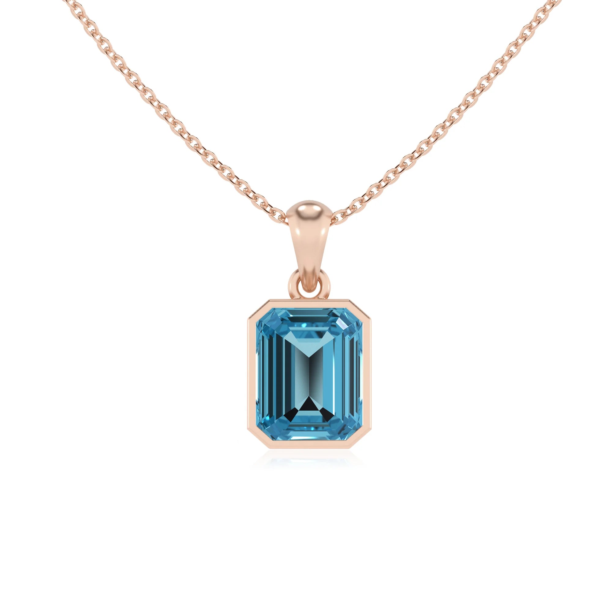 natural swiss-blue-topaz emerald cut solitaire necklaces in rose gold