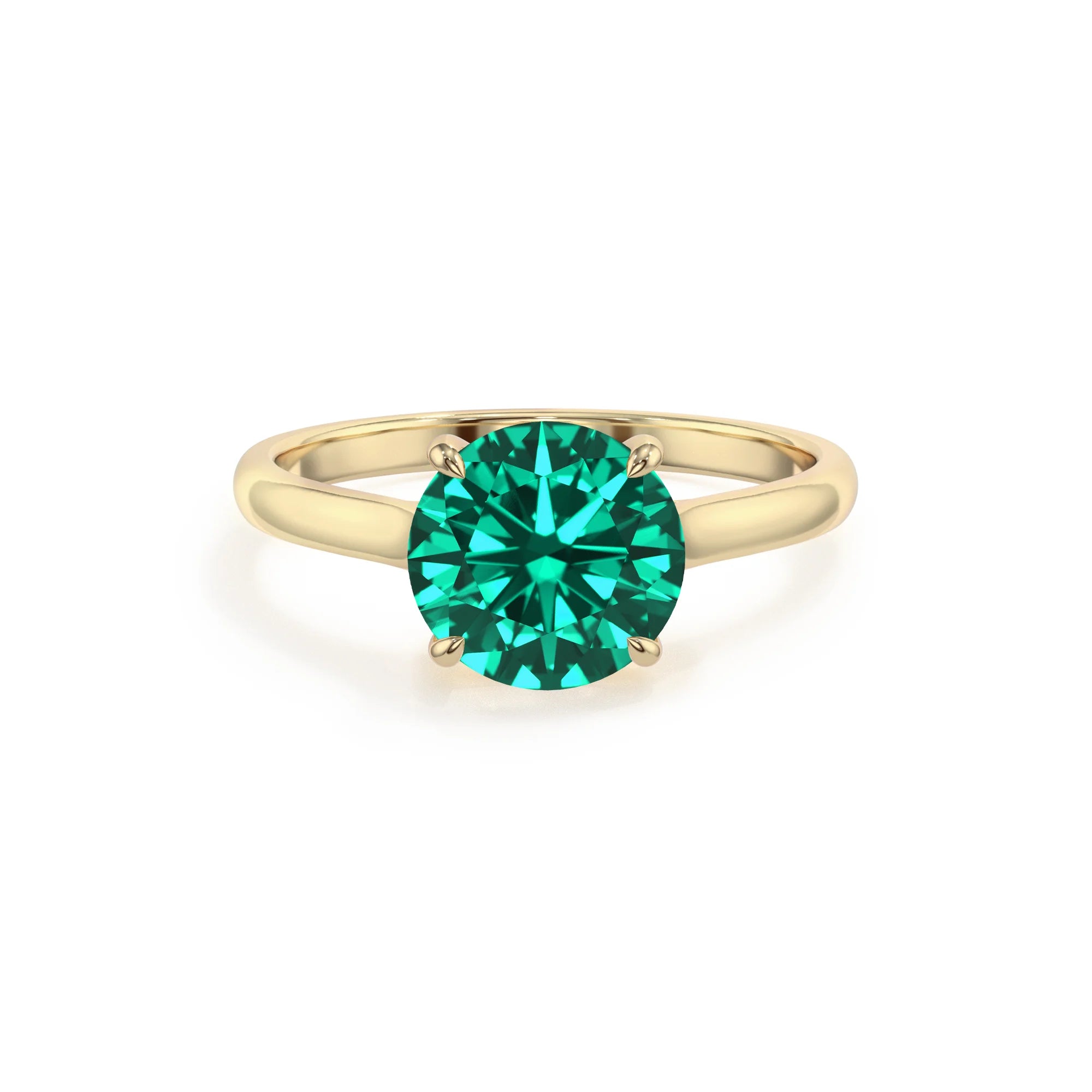 lab grown emerald round solitaire rings in yellow gold