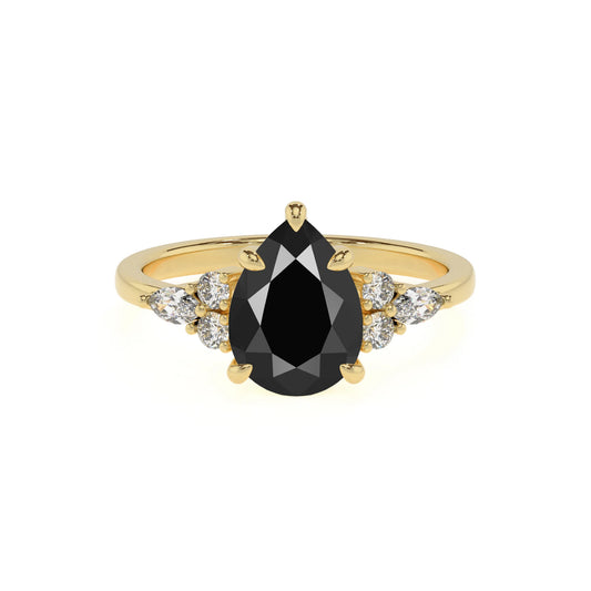 natural black-onyx pear solitaire rings in yellow gold