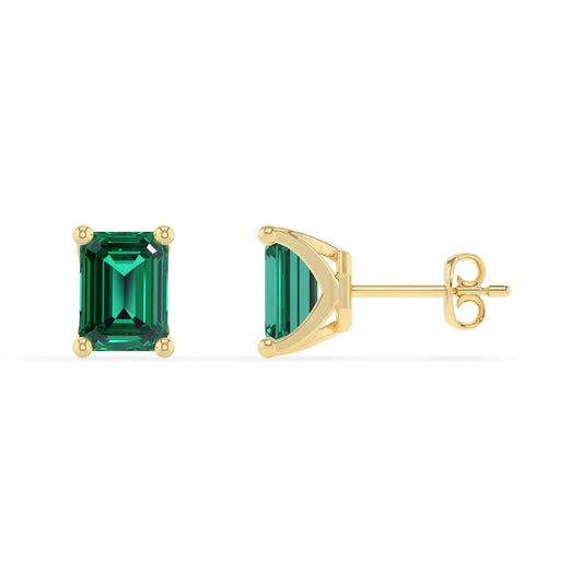 lab grown emerald octogon cut stud earrings in yellow gold