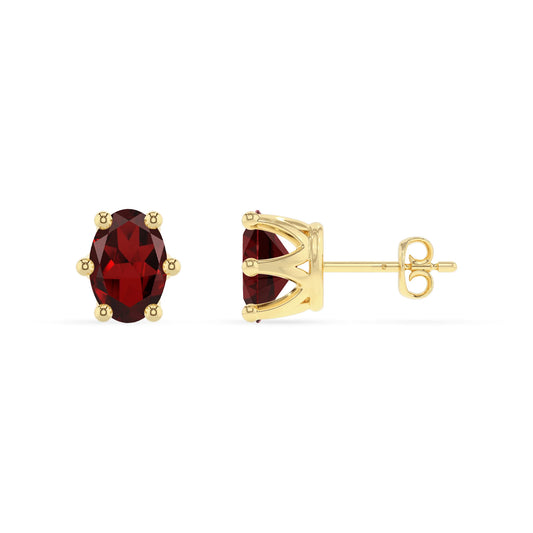 natural garnet oval stud earrings in yellow gold