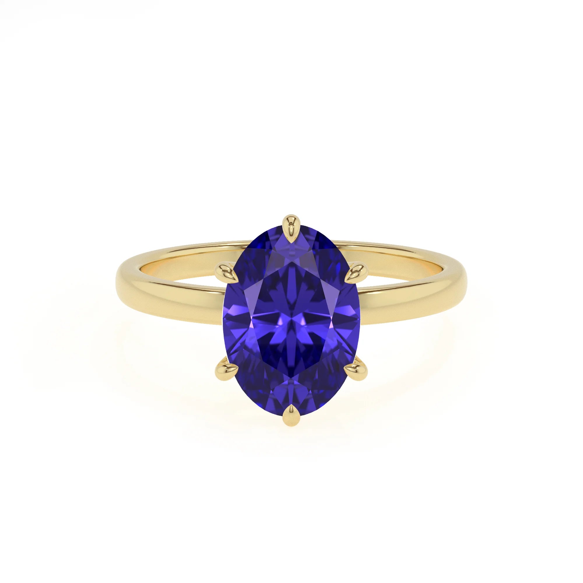 lab grown tanzanite oval solitaire rings in yellow gold