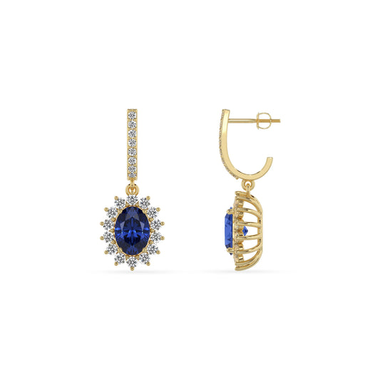 lab grown blue sapphire oval drop earrings in yellow gold