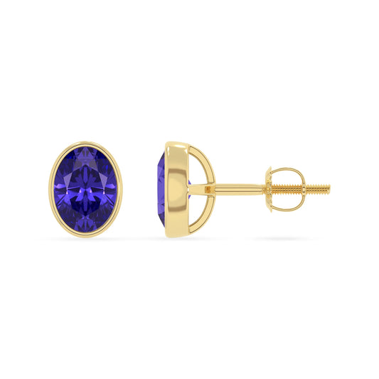lab grown tanzanite oval stud earrings in yellow gold