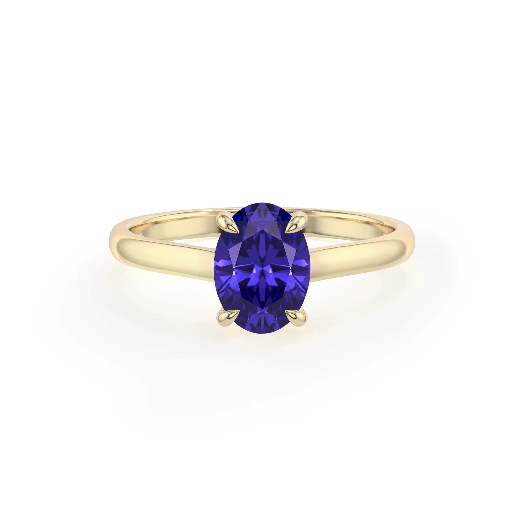 lab grown tanzanite oval solitaire rings in yellow gold