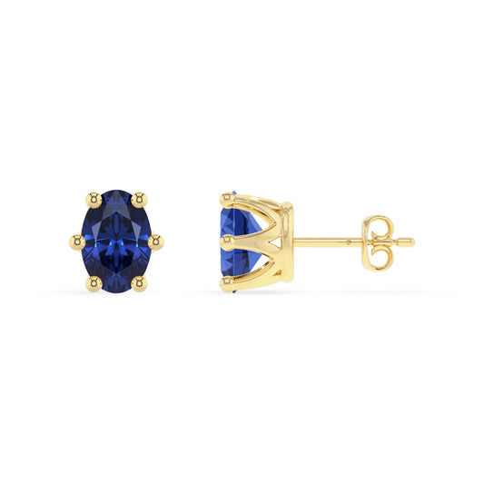 lab grown blue sapphire oval stud earrings in yellow gold