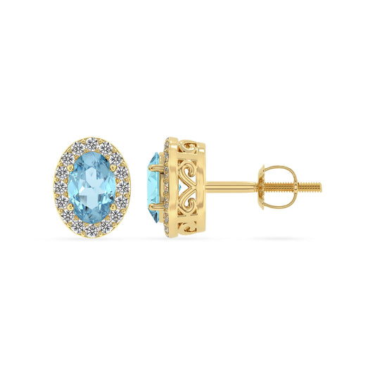 lab grown aquamarine oval stud earrings in yellow gold