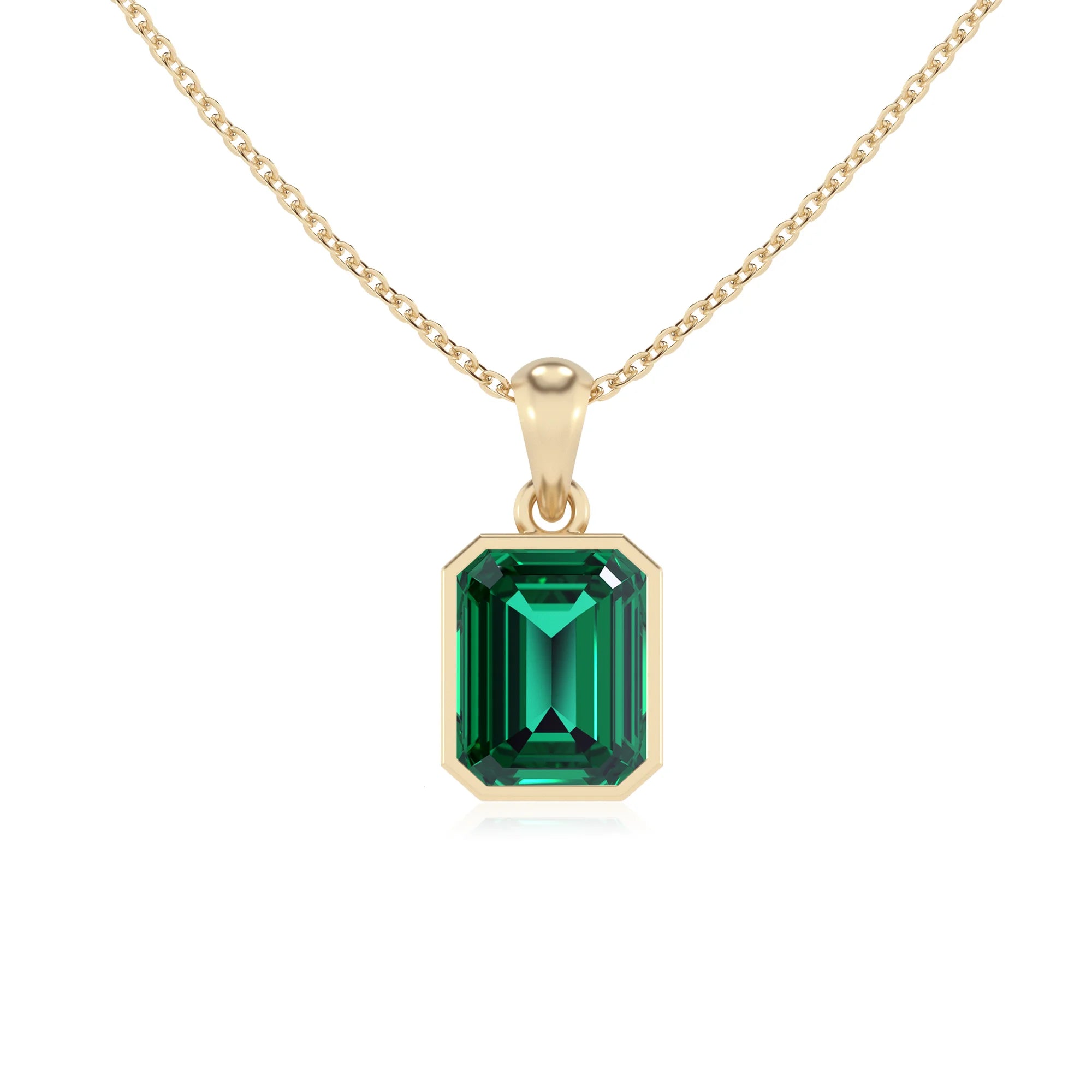 lab grown emerald octogon cut solitaire necklaces in yellow gold