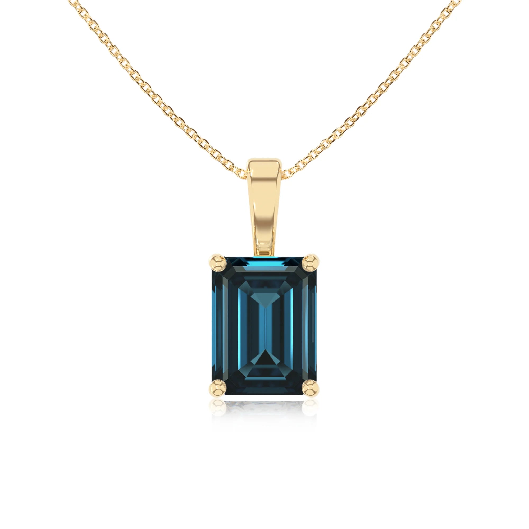 natural london-blue-topaz emerald cut solitaire necklaces in yellow gold