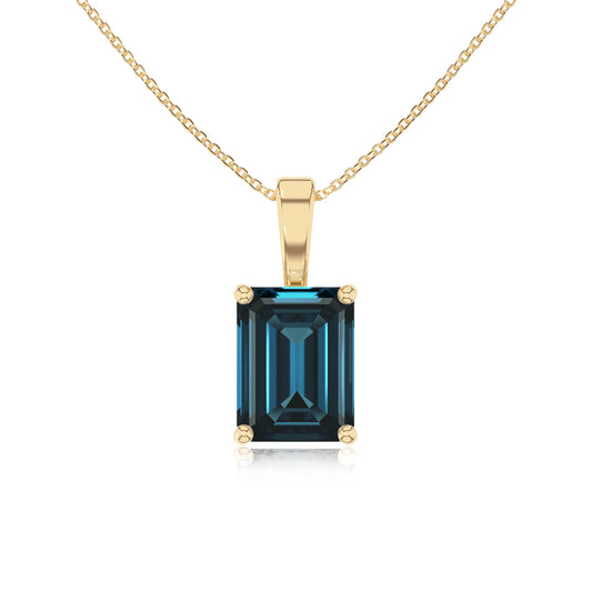 natural london-blue-topaz emerald cut solitaire necklaces in yellow gold
