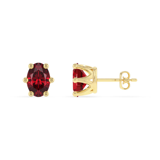 lab grown ruby oval stud earrings in yellow gold