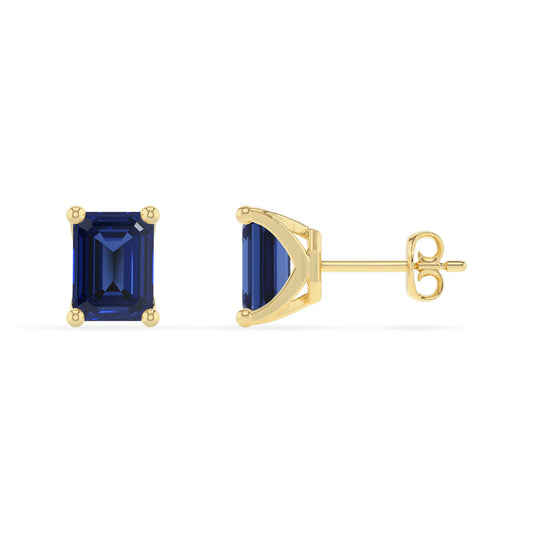 lab grown blue sapphire emerald cut stud earrings in yellow gold