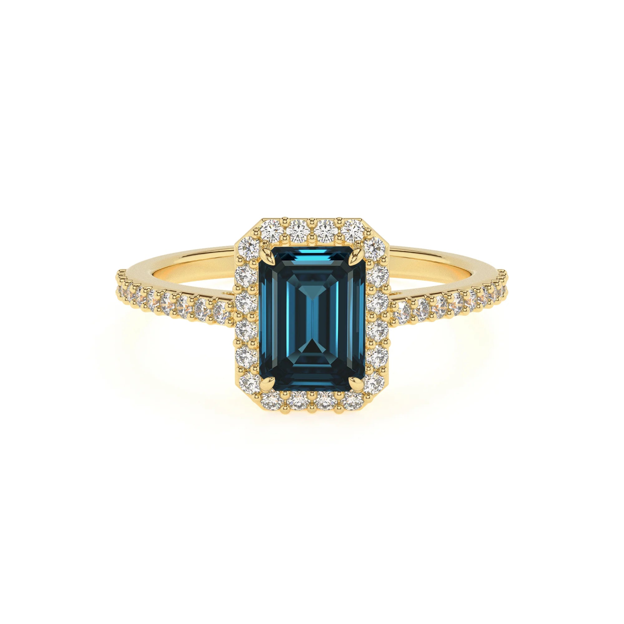 natural london-blue-topaz emerald cut solitaire rings in yellow gold