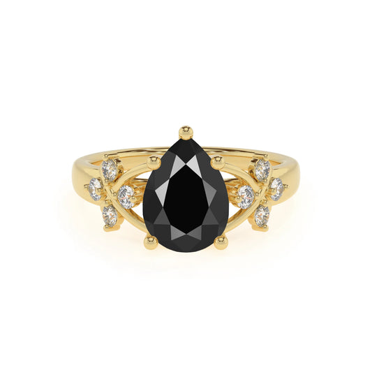 natural black-onyx pear solitaire rings in yellow gold