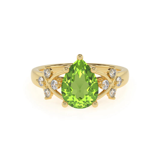 natural peridot pear solitaire rings in yellow gold