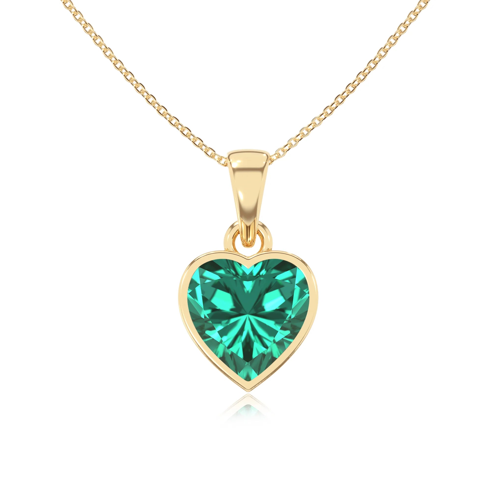 lab grown emerald heart solitaire necklaces in yellow gold