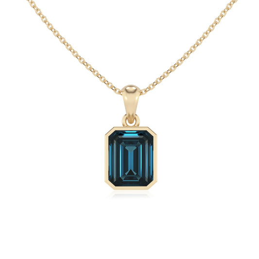 natural london-blue-topaz emerald cut solitaire necklaces in yellow gold