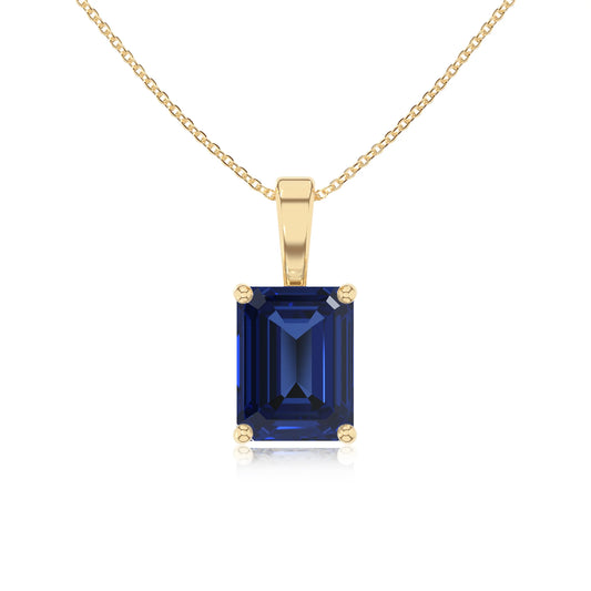 lab grown blue-sapphire emerald cut solitaire necklaces in yellow gold