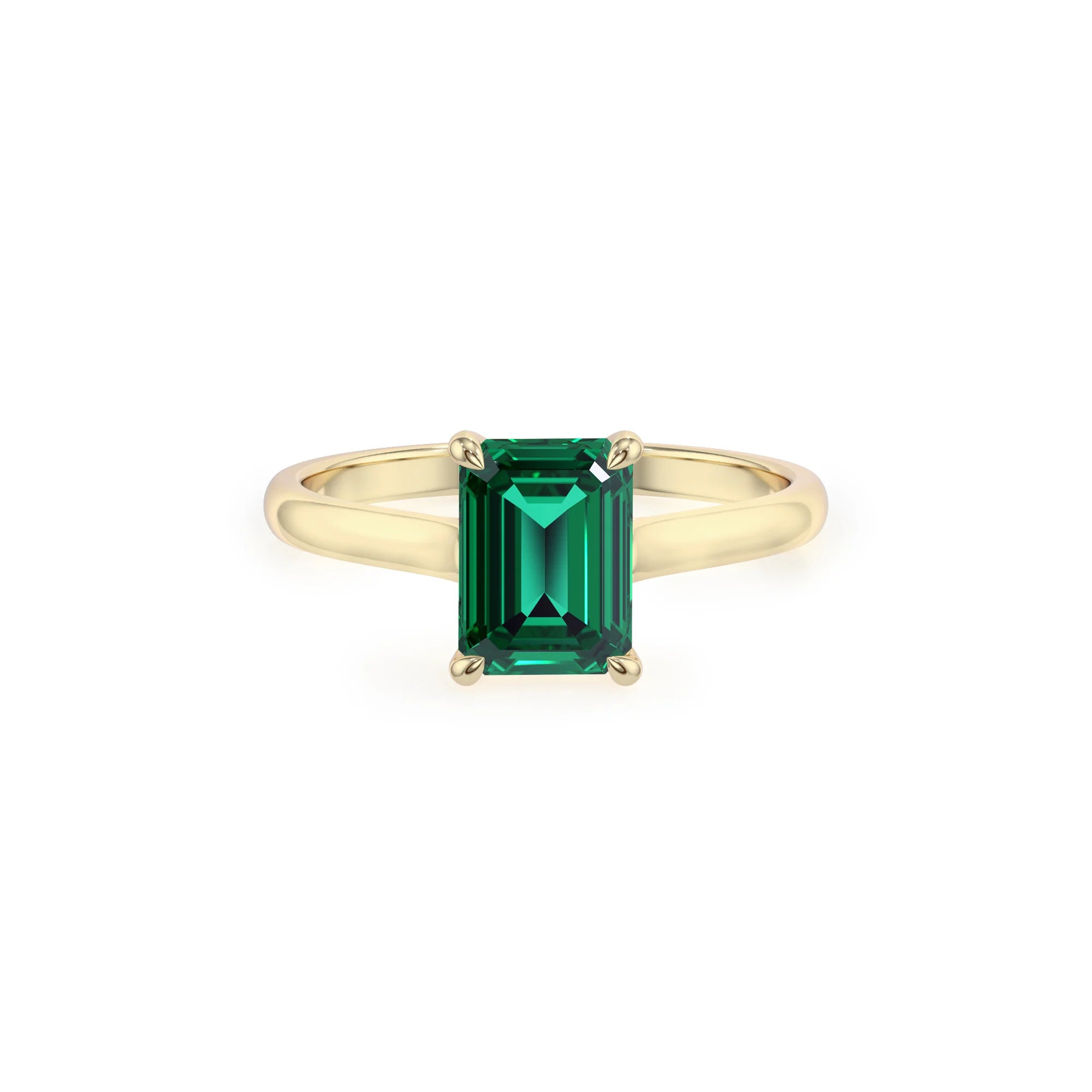lab grown emerald octogon cut solitaire rings in yellow gold