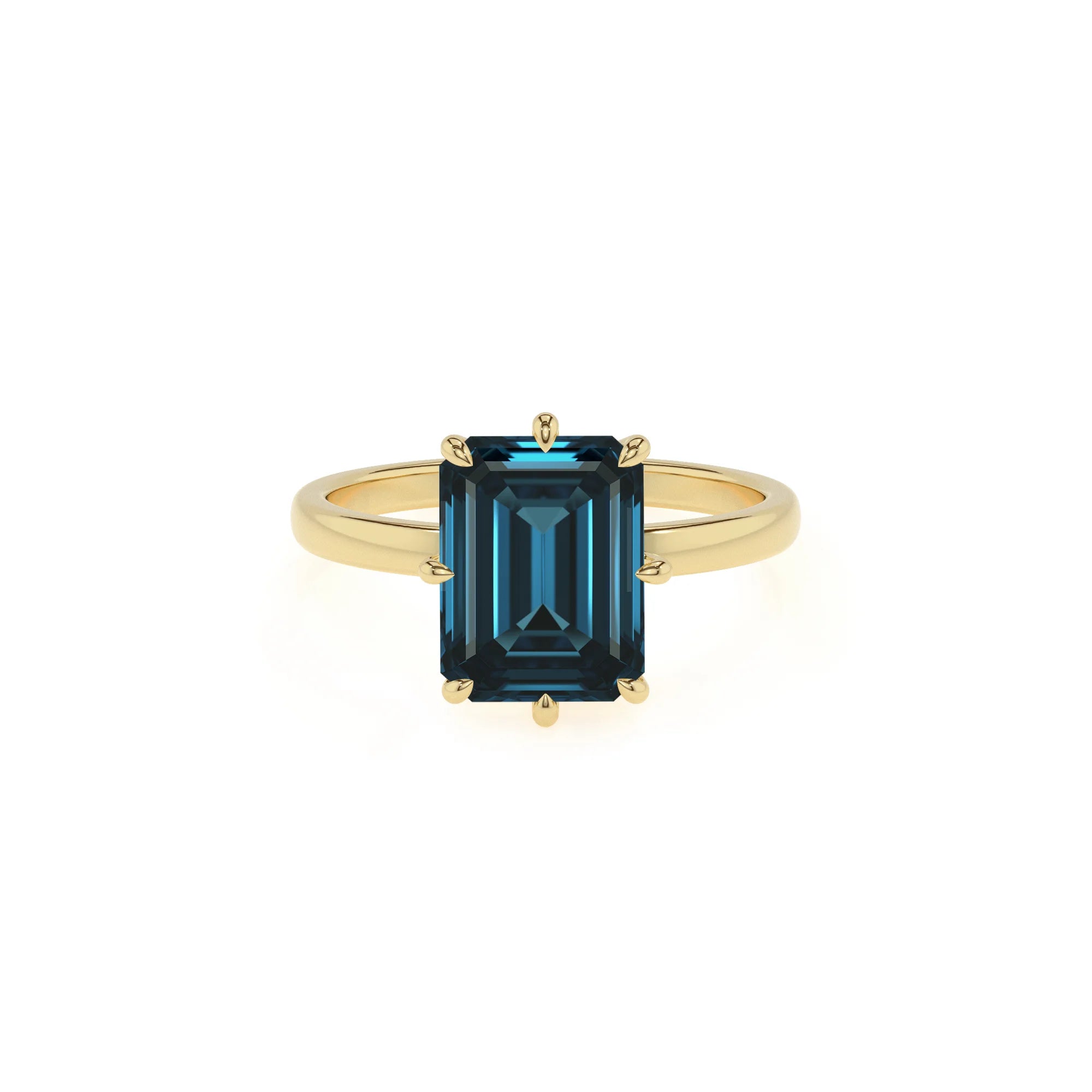 natural london-blue-topaz emerald cut solitaire rings in yellow gold