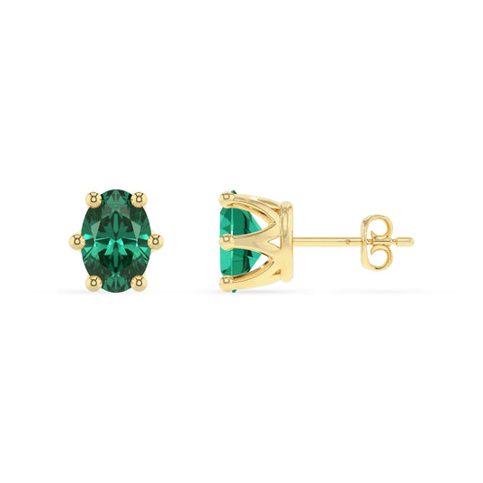 lab grown emerald oval stud earrings in yellow gold